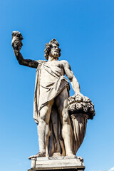 Statue of the Greek mythology God Bacchus in the historic center of Florence, Tuscany, Italy, Europe