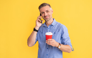 Fototapeta premium smiling guy drink takeaway tea. good morning. communication.