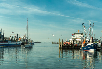 Fototapeta na wymiar Fishing ships in a small harbour,North Sea,Germany