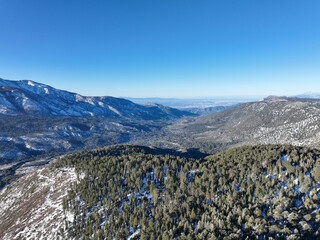 Aerial view over Big Bear Lake and San Bernardino National Forest with now, South California, USA