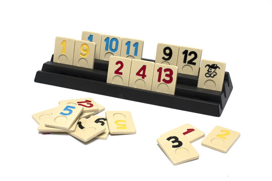 rummy game pieces stacked stand white background