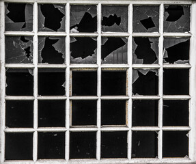 Closeup of a window grill with broken glass - Powered by Adobe