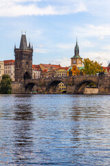 Fototapeta na wymiar Vltava river and Charles bridge in Prague