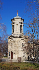 Fototapeta na wymiar Church in Kerch Park in Ukraine with a dome against the blue sky on a winter day