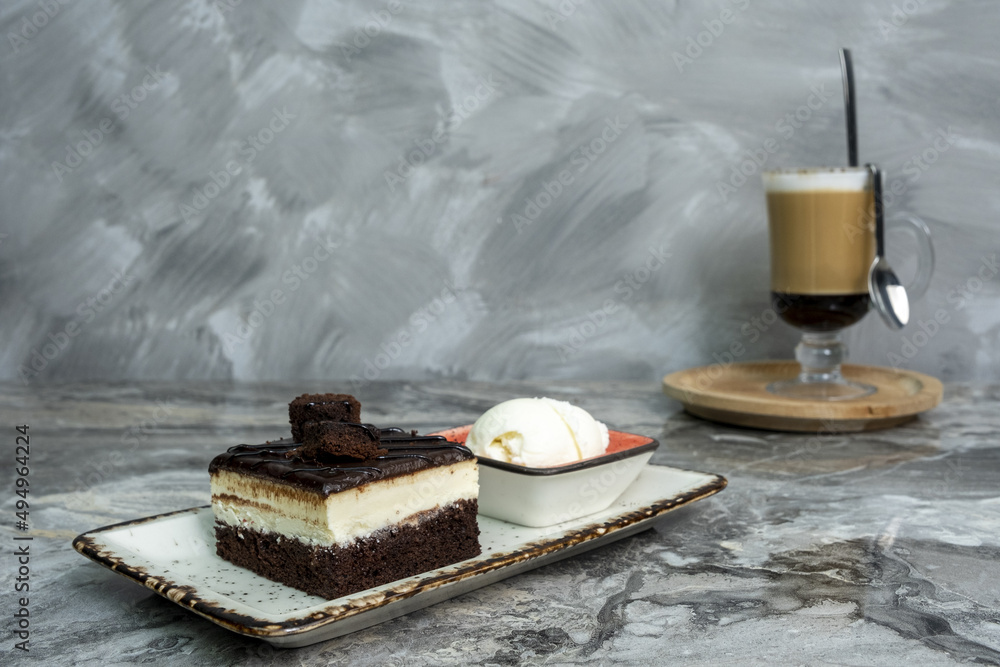 Wall mural slice of cake on a marble surface