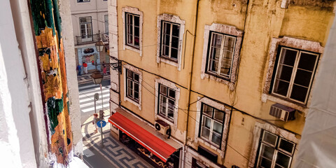 looking at the street through the window of an old building