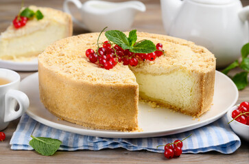 Royal cottage cheese cheesecake decorated with red currants and mint. Healthy dessert. Selective focus 