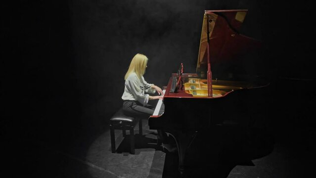 Professional musician at a rehearsal before a concert