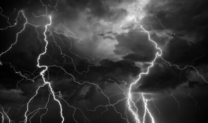 Fork lightning striking down during summer storm