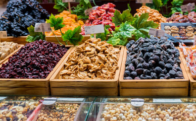 Close up of display with traditional turkish delights, dried fruits and nuts at Egyptian Bazaar. Best delicious turkish foods to try on trip to Istanbul. Selective focus