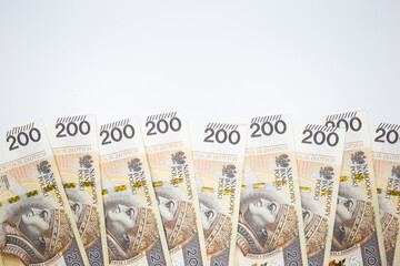 Zloty - Polish banknote. Polish currency on a white background arranged in a pattern. Illustrates cash flow and business