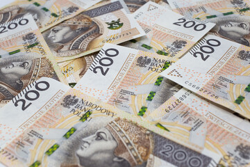 Zloty - Polish banknote. Polish currency on a white background arranged in a pattern. Illustrates cash flow and business