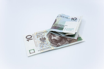 Zloty - Polish banknote. Polish currency on a white background arranged in a pattern. Illustrates cash flow and business
