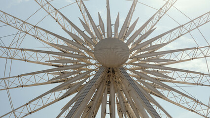 Obraz premium Ferris wheel. Observation wheel. Sun symbol