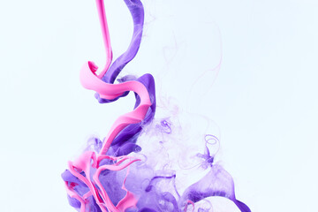 Fototapeta premium Paint splash abstract background. Acrylic ink drops. Pink and purple colors