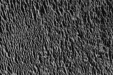 gray background, in the photo, gray concrete wall close-up.