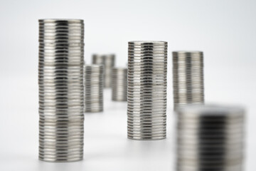 Stacks with Coins on White Background. Money Saving and Economy Concept