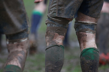 Closeup photo of feet of rugby players.