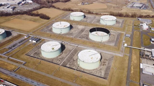 Aerial view of huge fossil oil storage reservoir tanks and facility