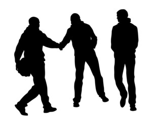 Young people in fashionable clothes on the street. Isolated silhouettes on white background