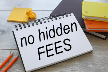 No hidden fees notepad with text on scattered notepads on the work table. stickers and colorful notepads business concept.
