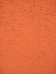 Orange cement stucco texture.