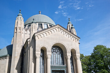 Gothic style Memorial building exterior with architectural dome and stained glass