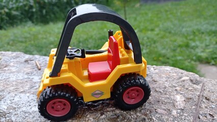 Fototapeta na wymiar toy truck on the grass