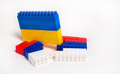 War between Ukraine and Russia. Concept in the form of a constructor with the colors of national...