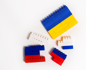 War between Ukraine and Russia. Concept in the form of a constructor with the colors of national...