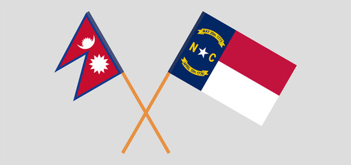 Crossed flags of Nepal and The State of North Carolina. Official colors. Correct proportion