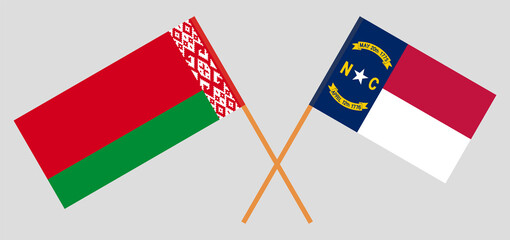 Crossed flags of Belarus and The State of North Carolina. Official colors. Correct proportion