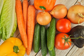 Fresh Summer Vegetables on a Rustic Wooden Table, overhead flat lay view