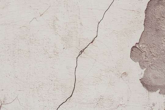  textured cracked white old wall background for copy space.
