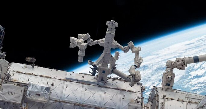 View of International space station on orbit of Earth. ISS. Some elements of the video furnished by NASA
