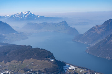 Fototapeta na wymiar Pilatus – the dragon mountain on Lucerne’s doorstep. Escape the city and head up to Pilatus Kulm at an altitude of 2'132 m on the world’s steepest cogwheel railway. The arrival by boat or by train