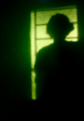 silhouette of a person on a green background