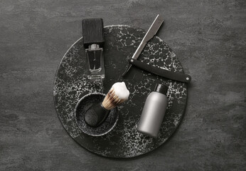 Stylish male accessories for shaving and perfume on black background