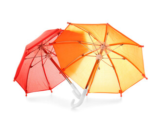 Colorful open umbrellas on white background