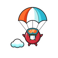 morocco flag mascot cartoon is skydiving with happy gesture