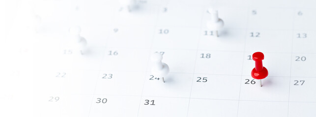 Thumbtack in calendar concept for busy, appointment and meeting reminder, planning for business meeting or travel planning concept.