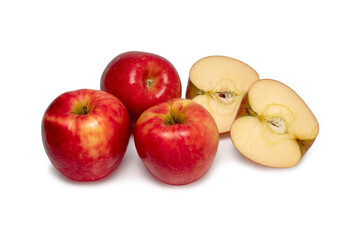 Naklejka na ściany i meble Whole ripe red apples and half cuts isolated on white background. Clipping path.