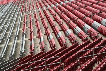 Rows of stadium seats forming a pattern