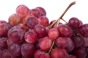 Red grapes photographed in a studio on a white background.