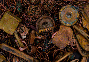 A scrap of an old wired and sheet copper material from a recycling company in the purpose of wallpaper and background - obrazy, fototapety, plakaty