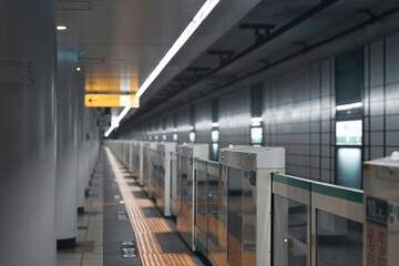Tokyo, Japan - March 24, 2022: Vacant subway platform in the morning
