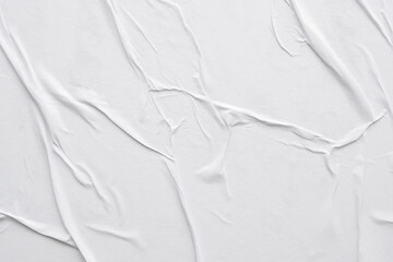 Blank white crumpled and creased paper poster texture background