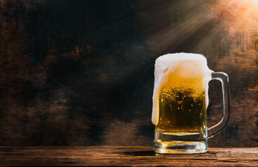 Glass beer on wood background
