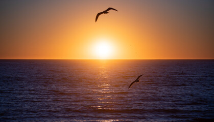 Fototapeta na wymiar Golden sunrise the sea waves. Sunrise over the ocean.