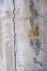 Old cement wall with cracks and abstract design background texture. Space for text, title.
